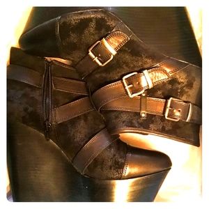 Jessica Simpson platform zip up boots